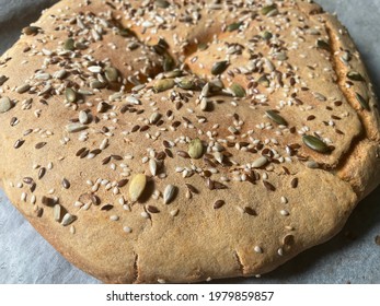 Fresh Gluten Free Bread On The Kitchen Counter Top. Sesame, Pumpkin, Various Seeds Mix. Baking Soda Bread No Yeast