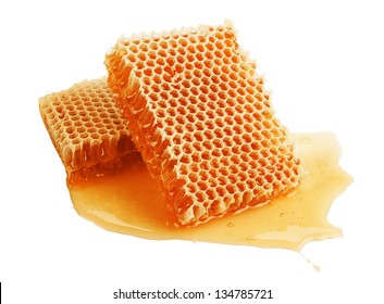fresh golden honeycomb isolated on white background