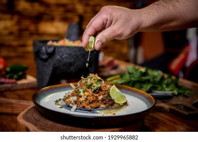 Fresh Gourmet Tacos On Plate With Lime Being Squeezed