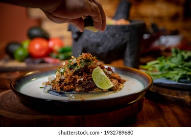 Fresh Gourmet Tacos On Plate With Chefs Hand