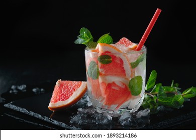 Fresh Grapefruit Cocktail. Fresh Summer Cocktail With Grapefruit And Ice. Glass Of Grapefruit Mojito