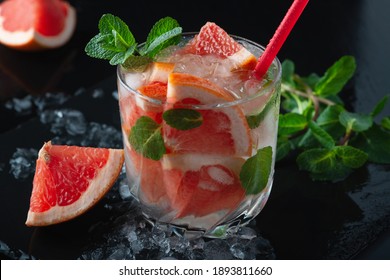 Fresh Grapefruit Cocktail. Fresh Summer Cocktail With Grapefruit And Ice. Glass Of Grapefruit Mojito