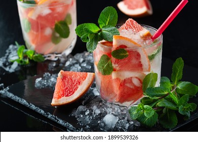 Fresh Grapefruit Cocktail. Fresh Summer Cocktail With Grapefruit And Ice. Glass Of Grapefruit Mojito.