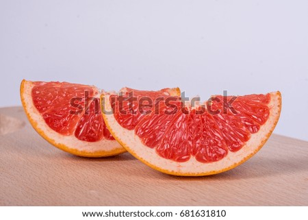 Similar – grinse-Grapefruit