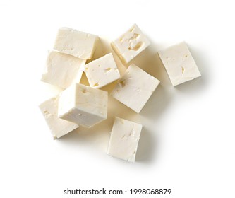fresh greek fitaki cheese pieces isolated on white background, top view
