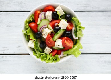 Fresh Greek Salad In A Bowl, Top View