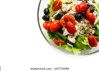 Fresh Greek Salad On A Plate On White Background