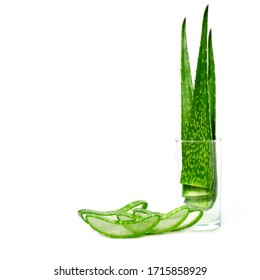 Fresh green Aloe vera leaves in glass isolated on white background  with clipping path..