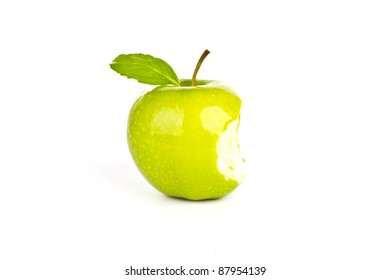Fresh green apple  with a bite  isolated on white background