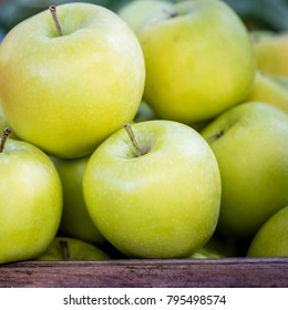 Fresh Green Apples In Wooden Box, Closeup.
Organic Apple Pile Display At Farmers Market In Sydney, Australia.
