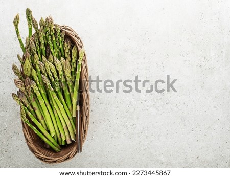 Fresh of green Asparagus. Basket of green asparagus, top view Image