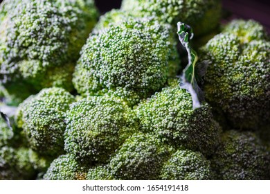 Fresh green broccoli background Close up . Healthy or vegetarian food concept. Macro shot - Powered by Shutterstock