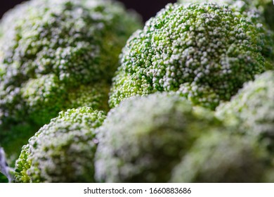 Fresh green broccoli background Close up . Healthy or vegetarian food concept. Macro shot - Powered by Shutterstock