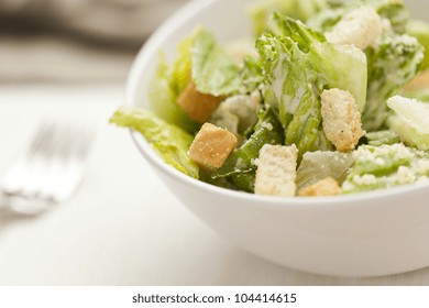 Fresh green Caeser Salad with croutons and cheese