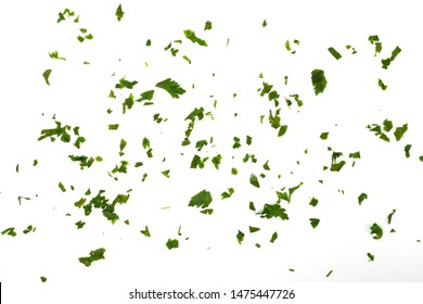 Fresh green chopped parsley leaves isolated on white background and texture, top view. Chopped parsley on a white background isolated. Chopped Parsley Leaves. Fresh Herbs 