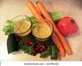 fresh green juice, carrots, pomegranate, carrot, celery, cucumber, cranberries 					