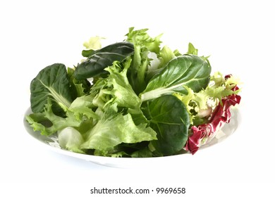 Fresh Green Leafy Salad With Tatsoi On Plate, Isolated On White