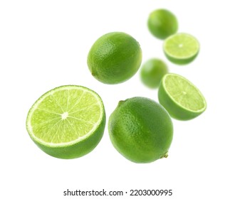 Fresh Green lime with cut in half levitate isolated on white background.