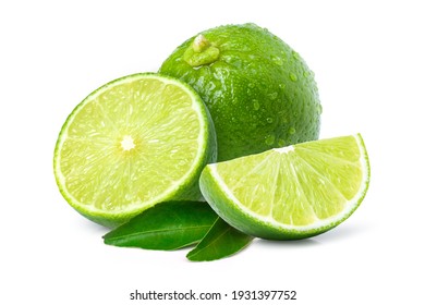 Fresh green lime fruit with water droplets and cut in half sliced isolated on white background.