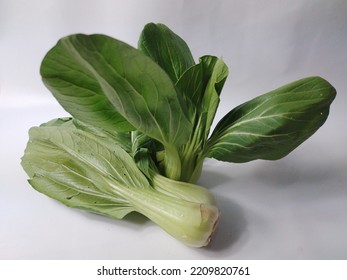 Fresh Green Mustard Greens (CaisimSawi Hijau) Are Isolated On White Background.