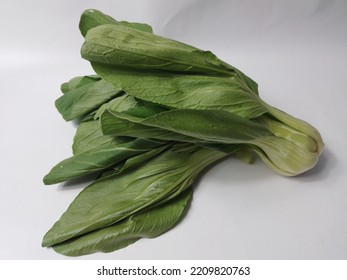 Fresh Green Mustard Greens (CaisimSawi Hijau) Are Isolated On White Background.