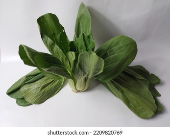 Fresh Green Mustard Greens (CaisimSawi Hijau) Are Isolated On White Background.