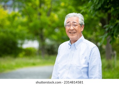 Fresh green, park, Japanese, male, portrait elegant, casual, middle aged, senior - Powered by Shutterstock