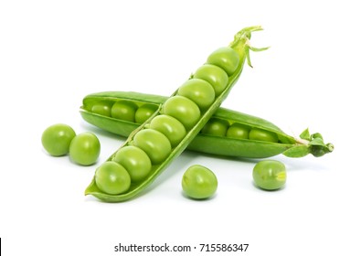 fresh green peas isolated on a white background - Shutterstock ID 715586347