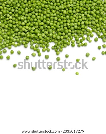 Fresh green peas are scattered on a white background, top view, copy space. Shelled grains of organic green peas on a white background. Vegetable protein, healthy products.