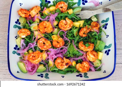 Fresh Green Salad With Blackened Shrimp, Pickled Red Onions And Pineapple In A Bowl