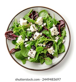 Fresh green salad with spinach ,arugula, romaine. Top with goat feta cheese, isolated on white background. - Powered by Shutterstock