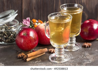 Fresh green tea with cinnamon and apples