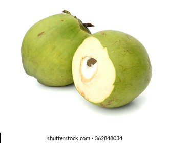 Fresh Green Young Coconut Split In Half Showing White Flesh, Isolated On White Background