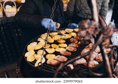 Fresh grilled smoked sheep cheese. Traditional polish local food. Traditional small Polish oscypek - fried sheep cheese, at street stall in Cracow, Poland. Festival of street food