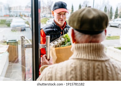 Fresh Groceries And Food Delivery For Elderly People. Old Senior Man Receiving Parcel. Meal Basket As Social Help And Support. Volunteerism. Online Order Service During Quarantine.