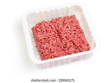 Fresh ground beef or mince in white plastic packaging.