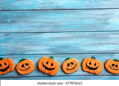 Fresh Halloween Gingerbread Cookies On Blue Wooden Table