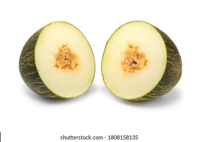Fresh halved sweet ripe Piel de Sapo melon close up isolated on white background