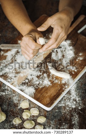 Similar – Foto Bild Frau beim Kneten von handwerklichem Brot auf Holztisch