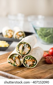 Fresh Healthy Chargrilled Tandoori Chicken Wrap With Tzatziki, Cheese, Baby Spinach And Carrots 