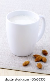 Fresh And Healthy Cup Of Almond Milk Made With Organic Soybeans