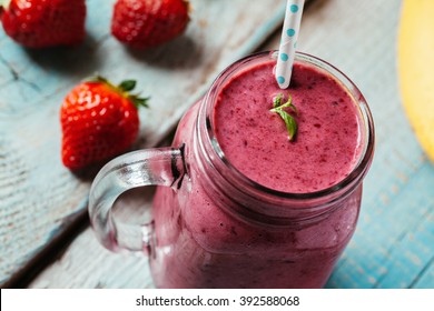 Fresh Healthy Smoothie Made Of Banana And Berries