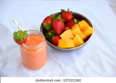 Fresh Healthy Vegan Papaya Mango Strawberry Smoothie