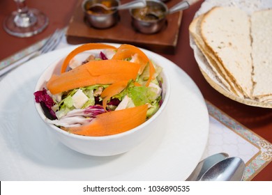 Fresh Healthy Vegetable Salad With Carrot Shavings And Bread