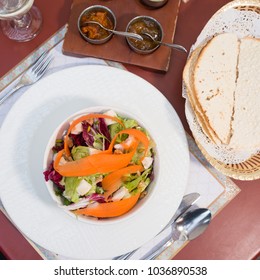 Fresh Healthy Vegetable Salad With Carrot Shavings And Bread