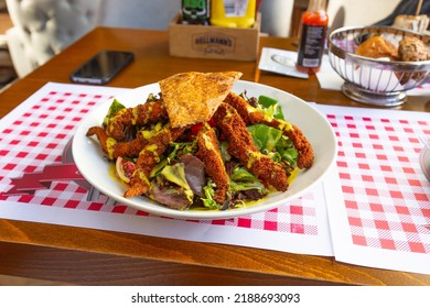 Fresh Herbs And Crispy Chicken Strips Salad