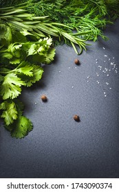 Fresh Herbs On Black Slate Stone. Organic Parsley, Dill And Allspice. Fresh Spices For Pickling. Organic Healthy Food.