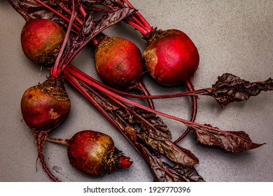 Fresh Homegrown Beetroot With Leaves On Black Stone Concrete Background. Healthy Plant Based Food, Local Produce Harvest, Top View