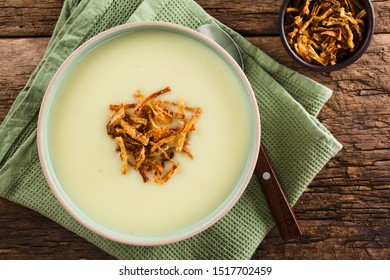 Fresh Homemade Cream Of Potato Soup In Bowl Garnished With Crispy Onion Strings, Photographed Overhead (Selective Focus, Focus On The Soup)