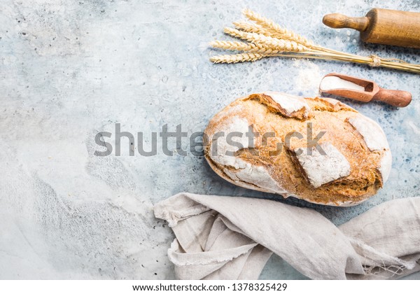 Fresh homemade crisp bread, top view.\
French bread. Bread at leaven. Unleavened\
bread